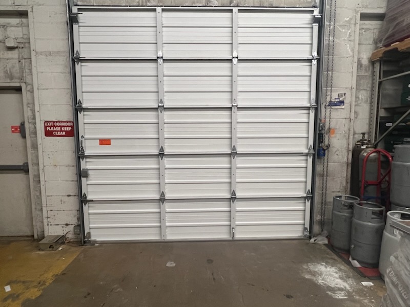 commercial door damaged by vehicle renton wa 2